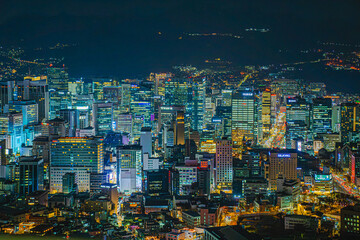 A view of Seoul city beautifully lit up at night.