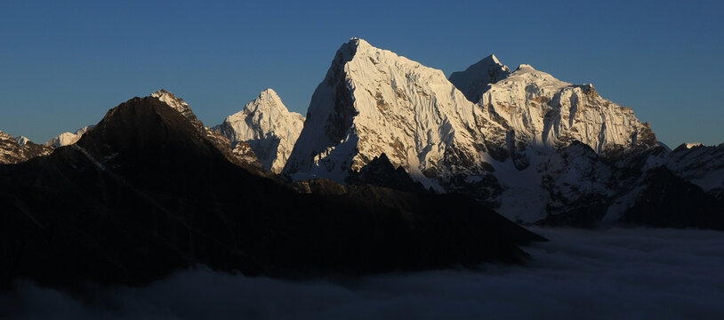 Bright lit peaks of Ama Dablam, Cholatse, Taboche and Tobuche, Nepal