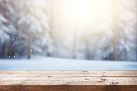 Bright image of empty wooden tabletop with blurred winter background