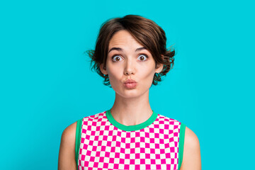 Photo of gorgeous pretty girl wear plaid stylish clothes blowing lips sending you kiss isolated on cyan color background - obrazy, fototapety, plakaty