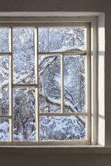 old window with snowy beautiful landscape