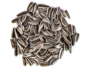 sunflower seeds in a pile isolated on white background (cut out roasted, raw seed) grain, turkish...