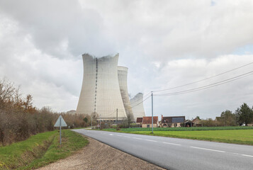 Down the road from three nuclear power station cooling towers