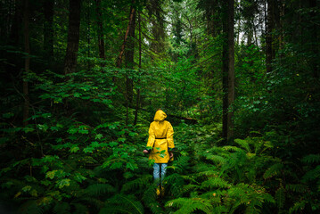 Woman in yellow raincoat