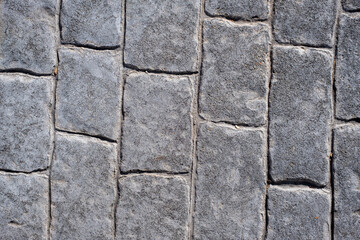 Asphalt texture in irregular rectangular blocks in vertical shape