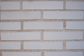Exposed brick wall texture in white color