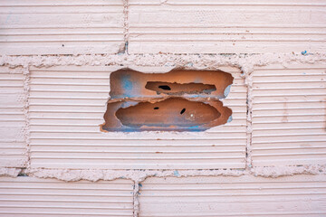 wall texture of large white and broken bricks in the scepter