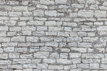 Gray brick wall texture, background photo