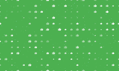 Seamless background pattern of evenly spaced white thumb up symbols of different sizes and opacity. Vector illustration on green background with stars