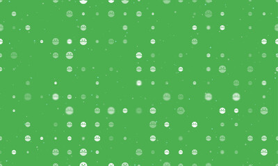 Seamless background pattern of evenly spaced white masked face symbols of different sizes and opacity. Vector illustration on green background with stars