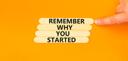 Remember why you started symbol. Concept word Remember why you started on beautiful wooden stick....