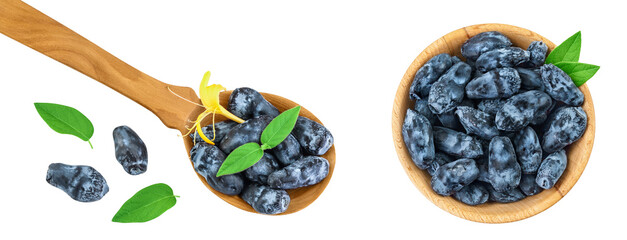 Fresh honeysuckle blue berry in wooden bowl and spoon isolated on white background with full depth...