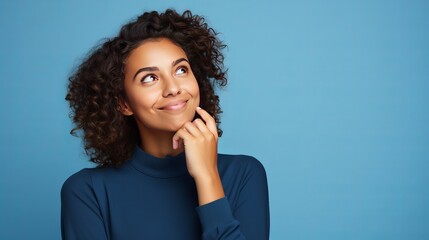 Youthful english lady disconnected on blue background thinking
