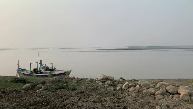 Sindh River Boating royalty.Aerial view of Sindh River Boating.People In Boats traveling in Sindh River and enjoy. Pakistani fishermen in Layyah Punjab go fishing on the river.Boat with load floating.
