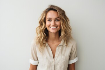 Fototapeta premium Vibrant and Joyful: Exuberant Young Woman Captured Gracefully