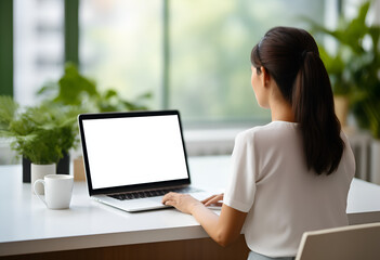 Over shoulder closeup view of female student wearing glasses businesswoman looking at empty blank mockup screen for advertising, having virtual videoconference. Remote e learning online work concept. 
