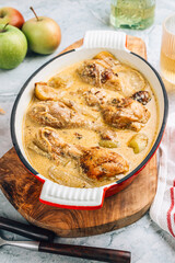 Chicken Normandy served in an enamel-coated cast-iron roaster