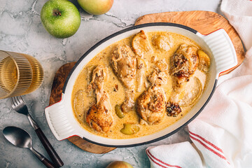 Chicken Normandy served in an enamel-coated cast-iron roaster