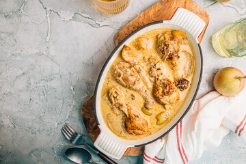 Chicken Normandy served in an enamel-coated cast-iron roaster