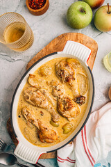 Chicken Normandy served in an enamel-coated cast-iron roaster