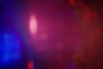 Red and purple textured pattern holiday bokeh. Abstract New Year background. Defocused blu and red holiday bokeh background. Lens flare Christmas lights.