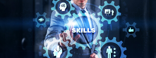 Businessman click on skills on virtual screen. Mixed Media