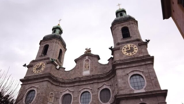 DOLLY SHOT - The St. James Cathedral, or Innsbruck Cathedral, is an eighteenth-century Baroque cathedral of the Roman Catholic Diocese of Innsbruck in the city of Innsbruck, Austria.