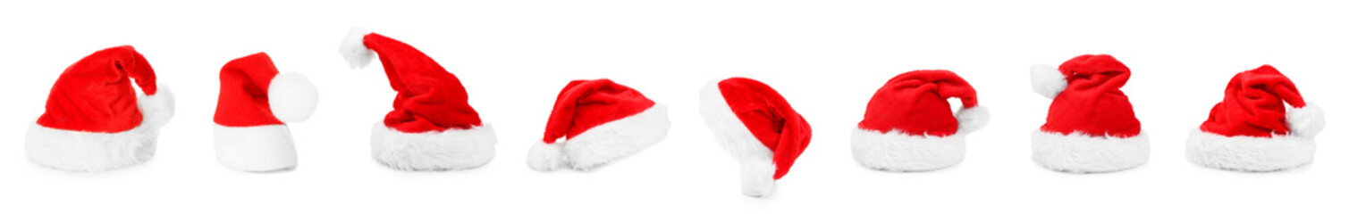 Obraz na płótnie Canvas Set of many Santa hats isolated on white
