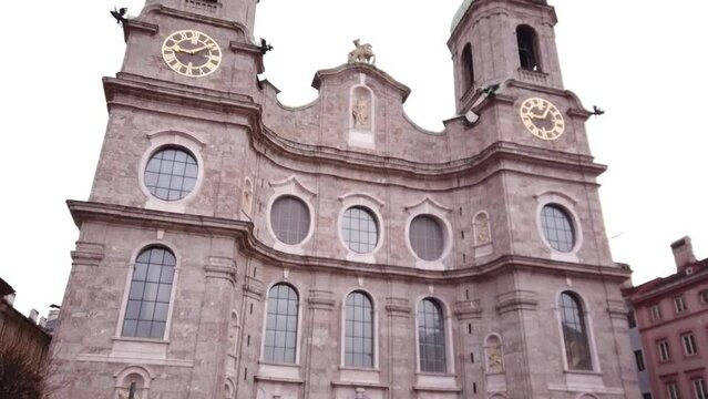 TILT SHOT - St. James Cathedral, or Innsbruck Cathedral, is a Baroque cathedral of the Roman Catholic Diocese of Innsbruck in the city of Innsbruck, Austria. Statues of saints from the Tyrol.