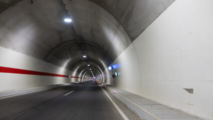 Underground tunnel with car moving on the road in the city. Underground tunnel with light and...