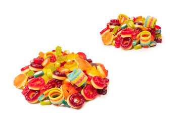 Assorted colorful gummy candies. Top view. Jelly donuts. Jelly bears. Isolated on a white background.