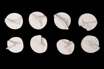 Round white stickers, blank tags labels isolated on a white background.