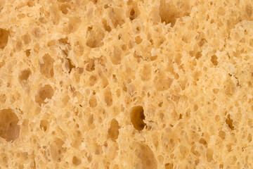 Fresh wheat bread close-up. Inside freshly baked delicious bread