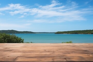 A wooden table set against the backdrop of the sea, an island, and the blue sky. A high-quality photo captures the serene scene.