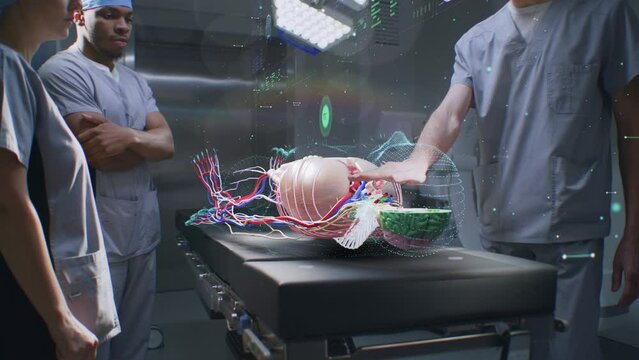 Multiethnic surgical team work in operating room using holographic display. 3D graphics of virtual human skeleton, organs and vital signs. VFX animation. AI technology in medicine. High-tech surgery.