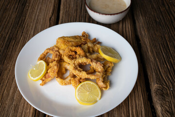fried calamari and lemon slices