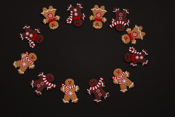 Christmas gingerbreads on a black backgroundChristmas cookies on a black background,Christmas...