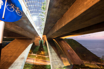 PERU Panoramic view of the Villena Rey Bridge of the Miraflores district with luxurious apartments and Pacific Ocean at night © Luis
