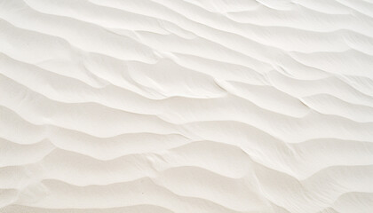 texture of close-up grooves produced by the wind that give the sand an appearance like small waves. The sand is light, slightly yellow in color - obrazy, fototapety, plakaty