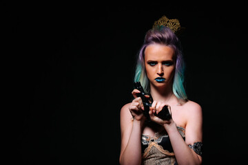 A woman with blue hair holding a gun. A Mysterious Femme Fatale with Electric Blue Hair, Gripping a Deadly Weapon - obrazy, fototapety, plakaty