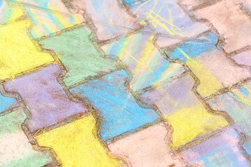 Sidewalk paving tiles covered in colorful chalk multi colored outdoors pavement, ground closeup,...