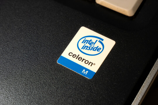 Intel Celeron Inside old obsolete laptop computer manufacturer sticker, old CPU processor label, retro computing, dated systems and hardware simple abstract concept