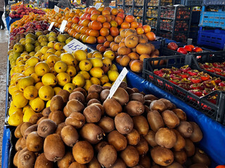 Various fruits at the farmers' market. quince, kiwi, grapefruit