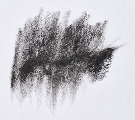 Black paint stroke with bristle brush, swatch on white background - obrazy, fototapety, plakaty