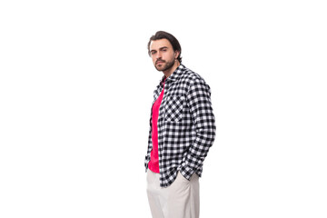 Fototapeta premium young macho brunet caucasian man with stylish haircut and beard on white background. people lifestyle concept