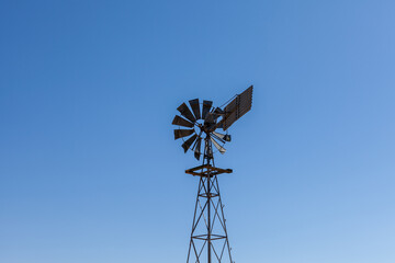 windmill on sky background