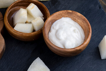 yogurt with melon flavor and ripe and delicious melon close-up