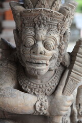 Fototapeta na wymiar Bali statue at temple entrance