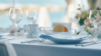 table setting in the restaurant interior light blue tones mediterranean style