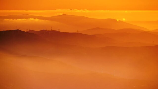 Burning sunset in high mountains above clouds.  Serra da Estrela in Portugal.
